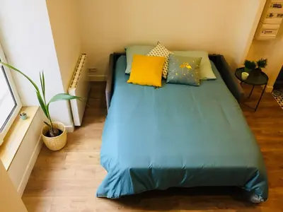 Un ou plusieurs lits dans un hébergement de l'établissement Appartement Amalfi Hyper Centre