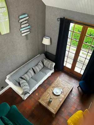 Coin salon dans l'établissement Capeden maison typique
