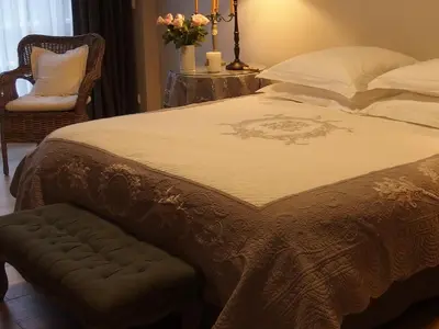 Un ou plusieurs lits dans un hébergement de l'établissement Au calme dans la campagne du Haut Anjou