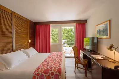 Un ou plusieurs lits dans un hébergement de l'établissement Hotel Ker Juliette