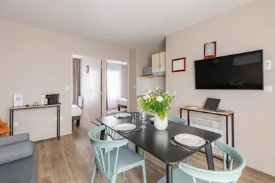 Télévision ou salle de divertissement dans l'établissement Appart'City Confort Nantes Cité des Congrès