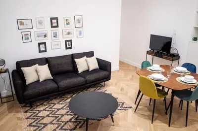 Coin salon dans l'établissement Hypercentre Charmant 2 Chambres Au Calme avec Joli Patio Privatif