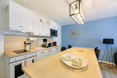 Cuisine ou kitchenette dans l'établissement Appartistic - Appartement des artistes