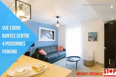 Coin salon dans l'établissement Appartistic - Appartement des artistes