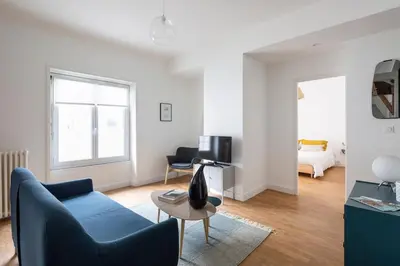 Coin salon dans l'établissement Harmonie - Magnifique appt proche Cité des Congrès