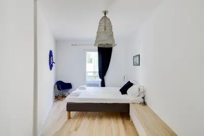 Un ou plusieurs lits dans un hébergement de l'établissement NOCNOC - Villa Paradis, piscine et rooftop au coeur de Nantes