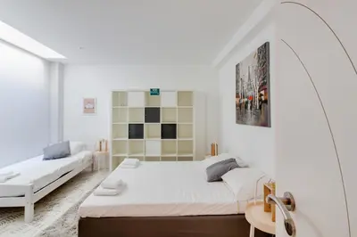 Un ou plusieurs lits dans un hébergement de l'établissement NOCNOC - Villa Paradis, piscine et rooftop au coeur de Nantes