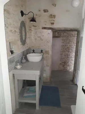 Salle de bains dans l'établissement l' Oiseau Bleu
