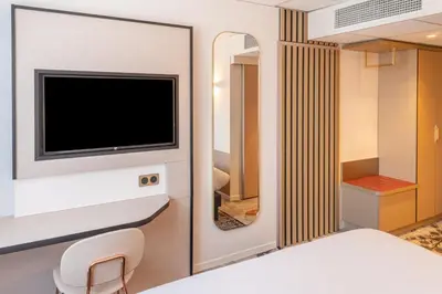 Télévision ou salle de divertissement dans l'établissement Brit Hotel Nantes La Beaujoire Parc Expo