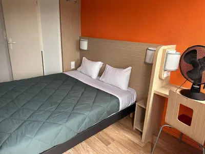 Un ou plusieurs lits dans un hébergement de l'établissement Premiere Classe Nantes Est St Sebastien Sur Loire