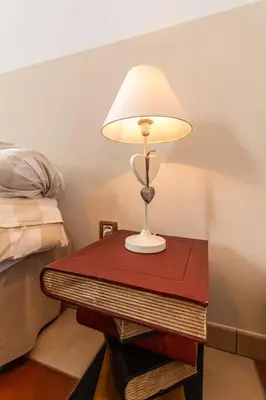 Un ou plusieurs lits dans un hébergement de l'établissement Le DOMAINE DES ECOLIERS B&B