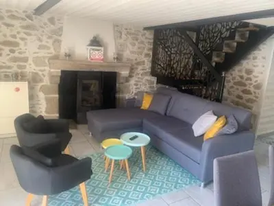 Coin salon dans l'établissement Gite le port sur mer