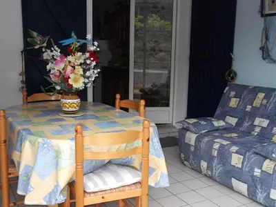 Coin salon dans l'établissement LA PORTE DES ILES