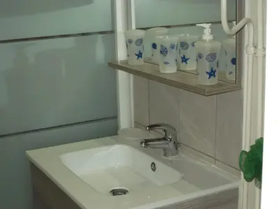 Salle de bains dans l'établissement LA PORTE DES ILES
