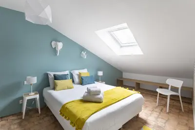 Un ou plusieurs lits dans un hébergement de l'établissement Le Nao- L'Île Feydeau - 2 chambres de charme