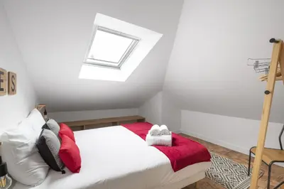 Un ou plusieurs lits dans un hébergement de l'établissement Le Nao- L'Île Feydeau - 2 chambres de charme