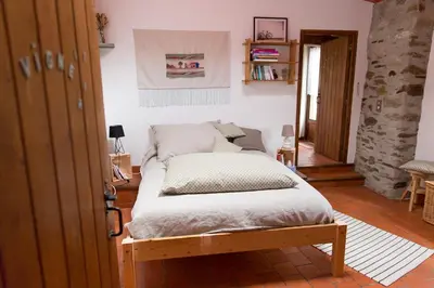 Un ou plusieurs lits dans un hébergement de l'établissement L'instant jardin
