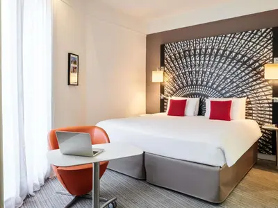 Un ou plusieurs lits dans un hébergement de l'établissement Mercure Nantes Centre Grand Hotel
