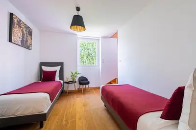 Un ou plusieurs lits dans un hébergement de l'établissement Marc's Flat - Calm & Cosy