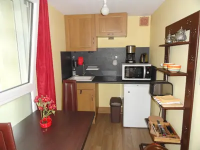 Cuisine ou kitchenette dans l'établissement Au Cadran Solaire