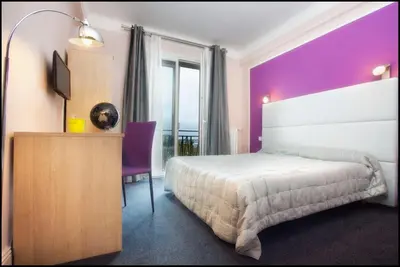 Un ou plusieurs lits dans un hébergement de l'établissement Hotel Le Berry Saint-Nazaire