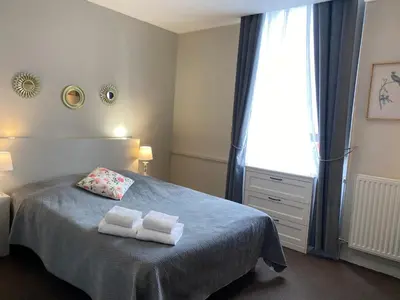 Un ou plusieurs lits dans un hébergement de l'établissement Hotel Saint Yves