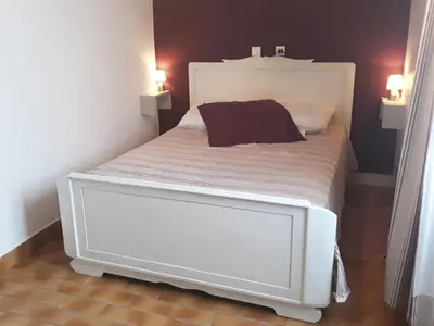 Un ou plusieurs lits dans un hébergement de l'établissement Un petit coin de campagne dans le pays de Saint-Gilles