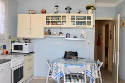 Cuisine ou kitchenette dans l'établissement Maison de famille à St Hilaire de Riez