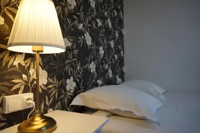 Un ou plusieurs lits dans un hébergement de l'établissement Hotel Saint Paul