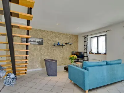 Coin salon dans l'établissement Holiday Home Le Graffi'Ty by Interhome