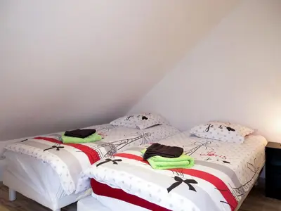 Un ou plusieurs lits dans un hébergement de l'établissement Holiday Home Le Graffi'Ty by Interhome