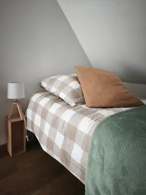 Un ou plusieurs lits dans un hébergement de l'établissement Gîte La Pâquerie