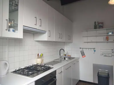 Cuisine ou kitchenette dans l'établissement Maison 3 pièces avec véranda et jardin, à 300m de la plage - La Guérinière - FR-1-224B-98