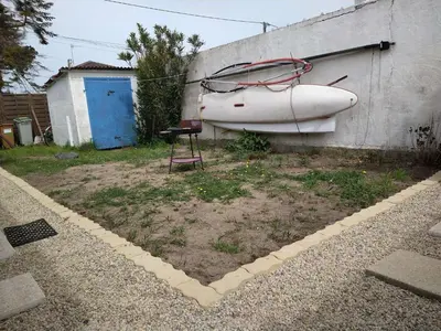 Jardin de l'établissement Maison 3 pièces avec véranda et jardin, à 300m de la plage - La Guérinière - FR-1-224B-98