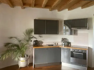 Cuisine ou kitchenette dans l'établissement Chateau de la Preuille Gites