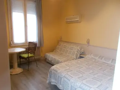 Un ou plusieurs lits dans un hébergement de l'établissement auberge de l arrivée