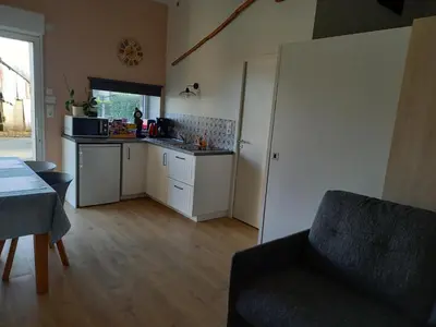 Cuisine ou kitchenette dans l'établissement Gîte la petite maison