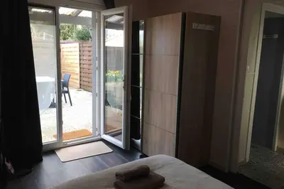 Un ou plusieurs lits dans un hébergement de l'établissement Maisonnette de 2 personnes