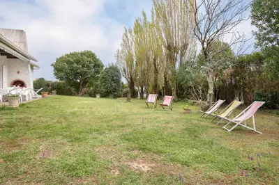 Jardin de l'établissement Tous à la mer dans une grande maison de famille !