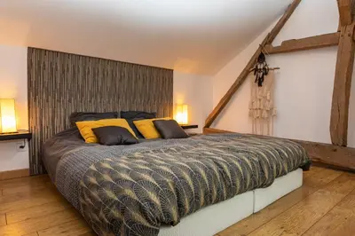 Un ou plusieurs lits dans un hébergement de l'établissement BELLILOIRE, Chambre à la campagne