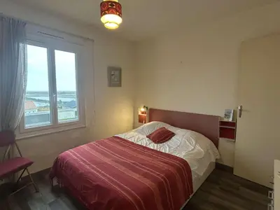 Un ou plusieurs lits dans un hébergement de l'établissement Appartement 3 pièces avec balcon, à 300m de la plage, La Guérinière - FR-1-224B-107