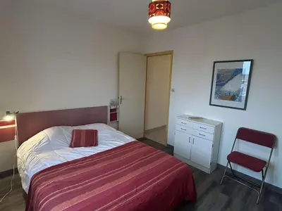 Un ou plusieurs lits dans un hébergement de l'établissement Appartement 3 pièces avec balcon, à 300m de la plage, La Guérinière - FR-1-224B-107