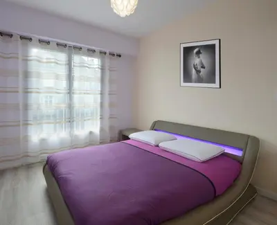 Un ou plusieurs lits dans un hébergement de l'établissement Appartement 2 chambres Angers Centre de Congrès
