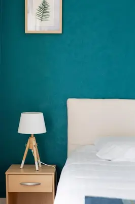 Un ou plusieurs lits dans un hébergement de l'établissement Le Singulier - 2 chambres et parking