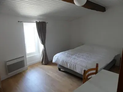 Un ou plusieurs lits dans un hébergement de l'établissement Grand gite du Puy Lambert