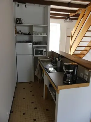 Cuisine ou kitchenette dans l'établissement Petit gite du Puy Lambert
