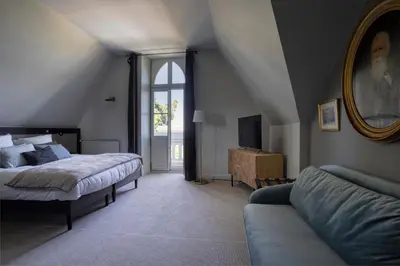 Un ou plusieurs lits dans un hébergement de l'établissement Le Château des Forges