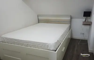 Un ou plusieurs lits dans un hébergement de l'établissement Appartement cosy à quelques mètres de la plage
