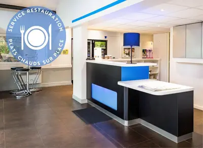 Cuisine ou kitchenette dans l'établissement Hôtel Ibis Budget Nantes Ouest Atlantis Couëron