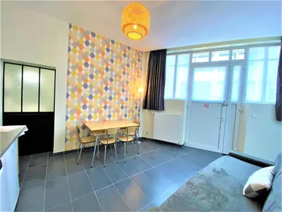 Coin salon dans l'établissement Appartements Rue Sarret XXL